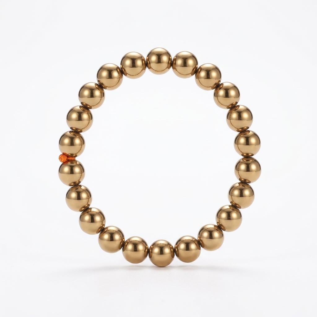 Golden hematite bracelet on a white background